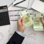 flat-lay-business-man-checking-finance-manners_23-2148793755