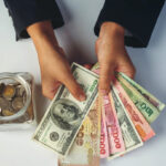 woman-employees-counting-money-white-desk_1150-20639dd